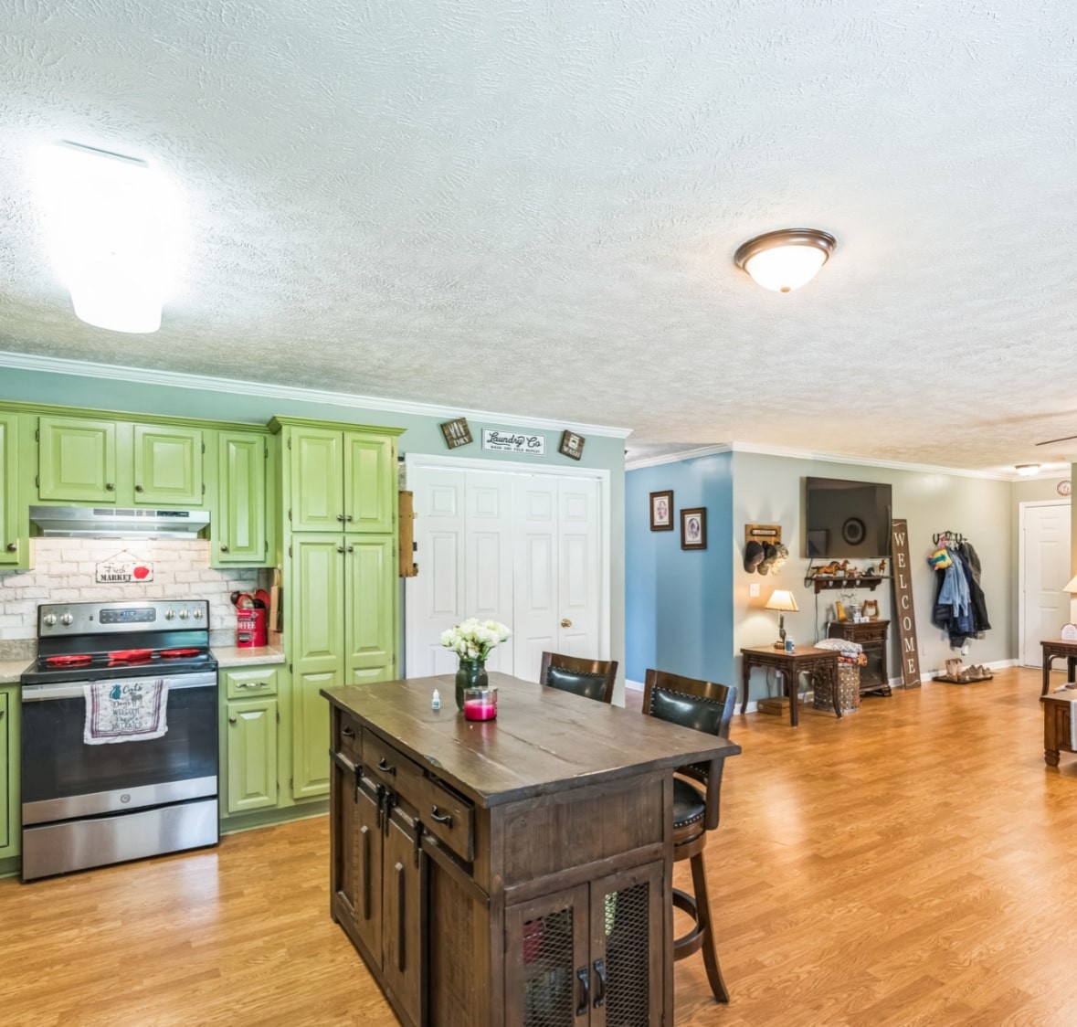 5312 West Trimble Road Milton, TN 37118 - Photo 24 of 42 a kitchen with stainless steel appliances granite countertop a stove and a refrigerator