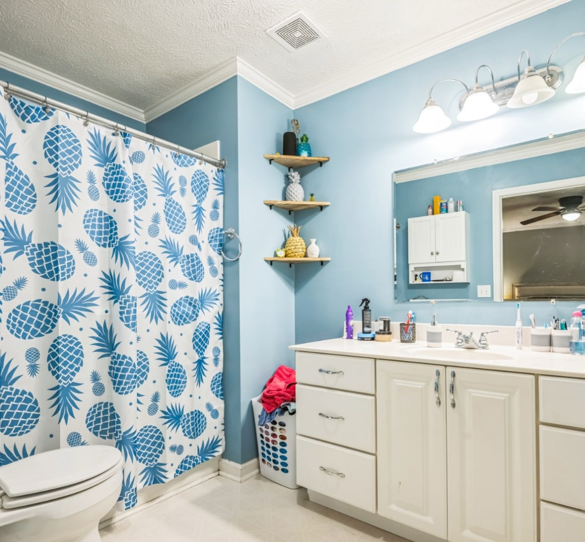 5312 West Trimble Road Milton, TN 37118 - Photo 38 of 42 a bathroom with a sink toilet and shower