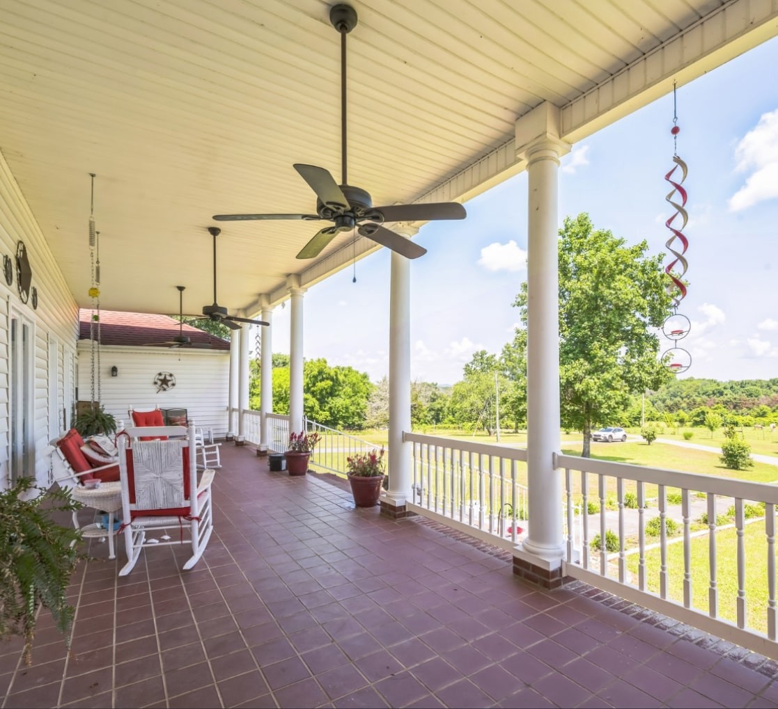 5312 West Trimble Road Milton, TN 37118 - Photo 4 of 42 a view of a chairs and table in the balcony