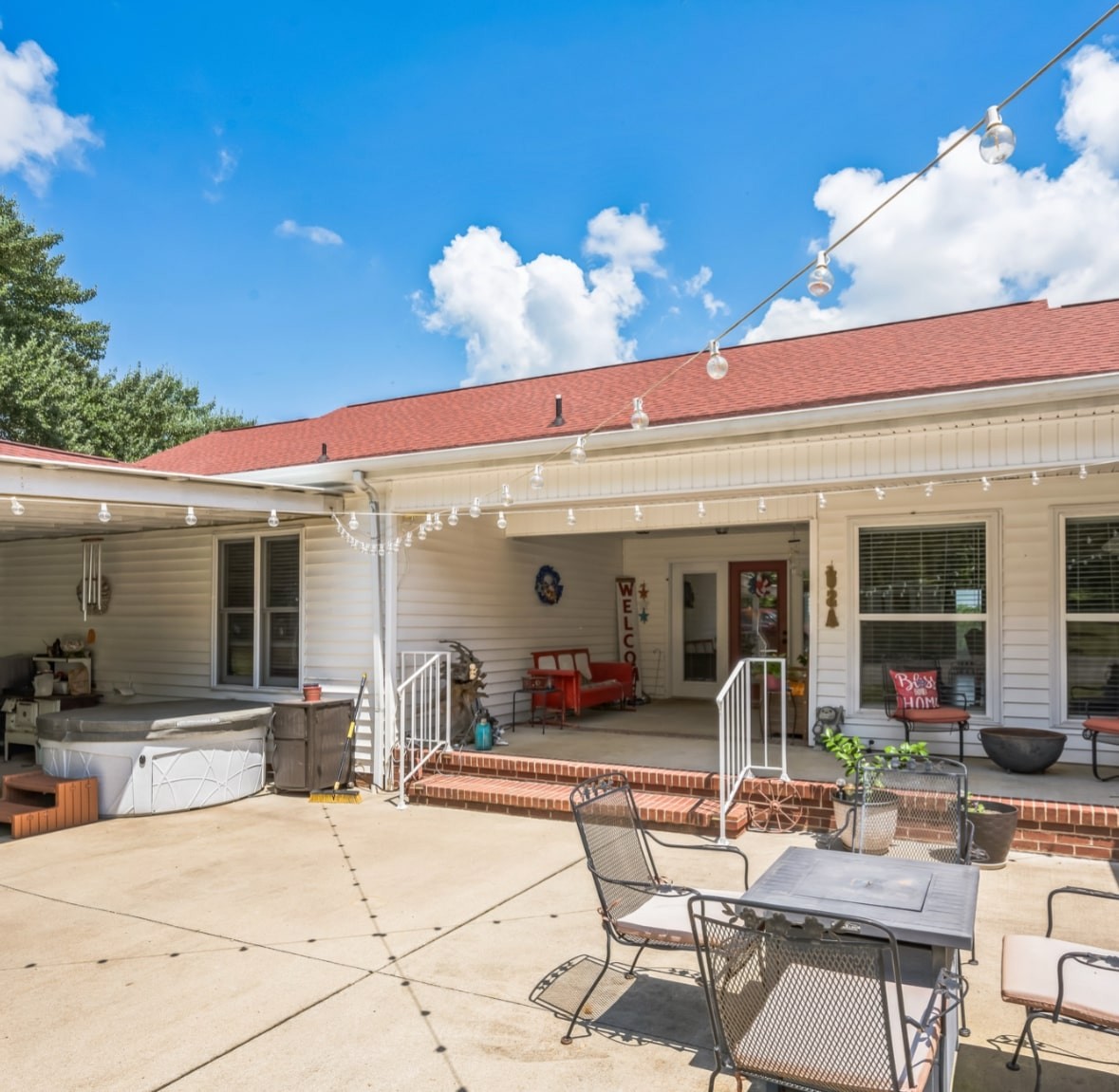 5312 West Trimble Road Milton, TN 37118 - Photo 41 of 42 a view of a house with patio outdoor dining space and plants