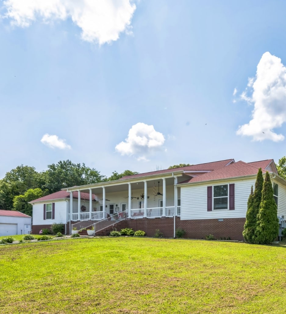 5312 West Trimble Road Milton, TN 37118 - Photo 6 of 42 a front view of a house with swimming pool having outdoor seating
