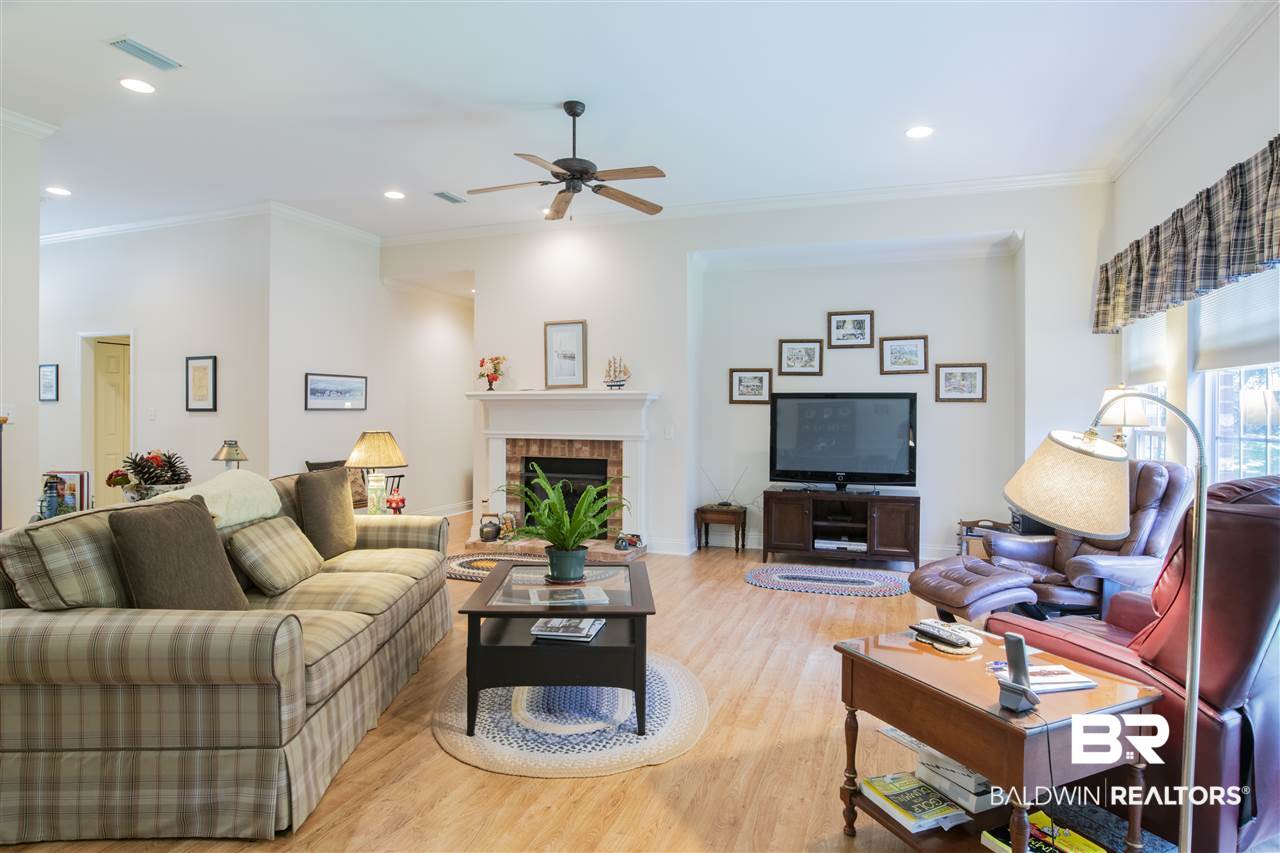 10950 Driver Court Fairhope, AL 36532 - Photo 11 of 36 Natural gas fireplace, wood floors