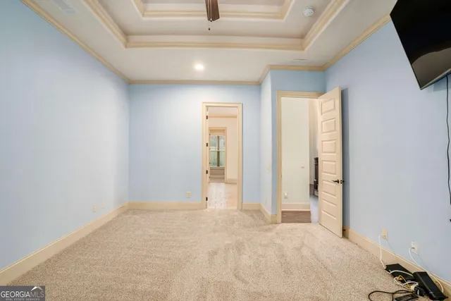 a bathroom with a granite countertop sink a mirror and a bathtub