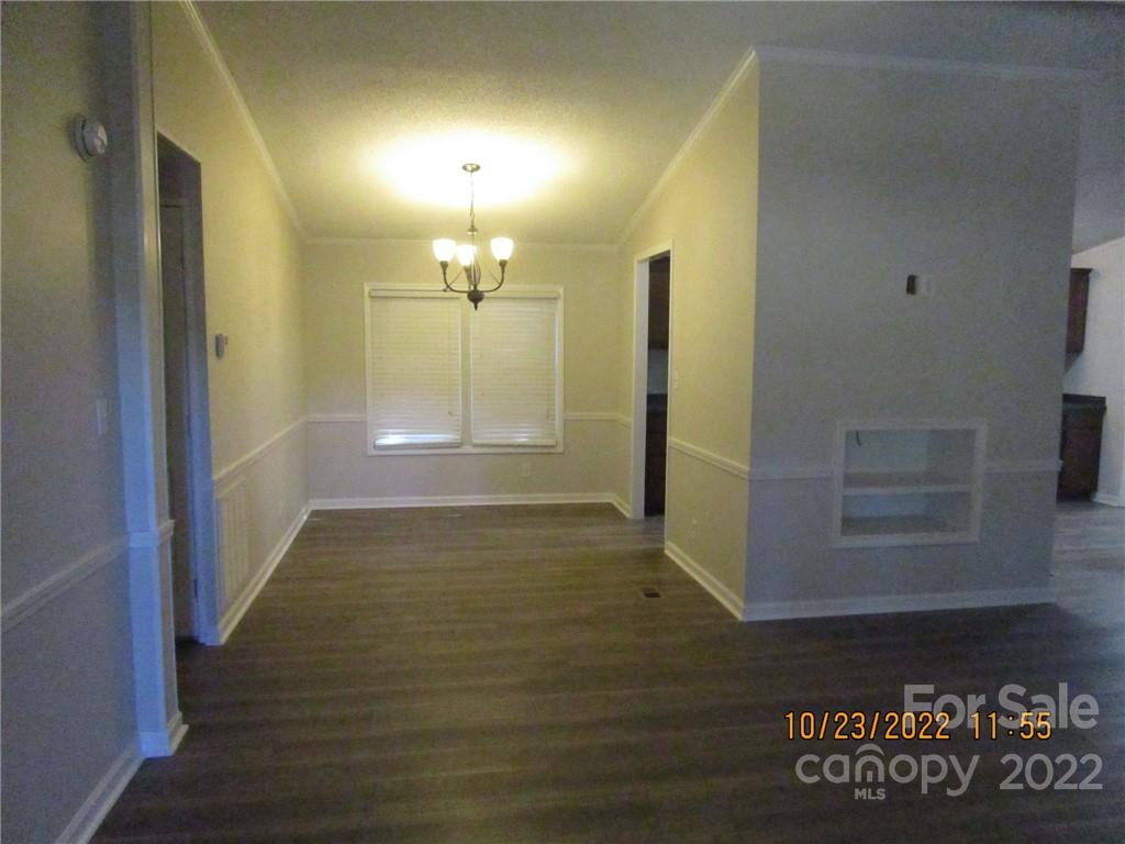 2605 Hinson Road, Unit P1 Monroe, NC 28112 - Photo 11 of 18 a view of a hallway with wooden floor