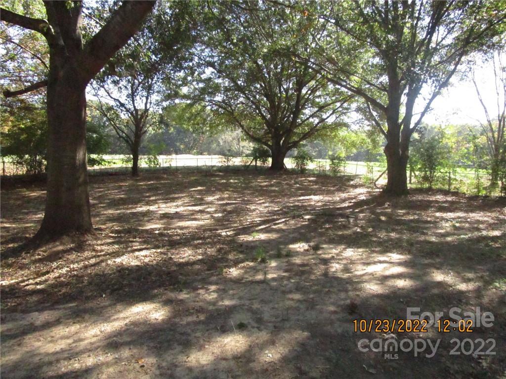 2605 Hinson Road, Unit P1 Monroe, NC 28112 - Photo 3 of 18 a view of road with trees