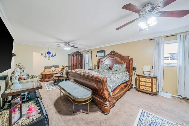 a bed room with a bed and a television