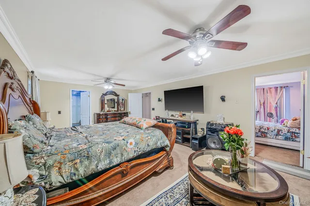 a bathroom with double vanity and a mirror