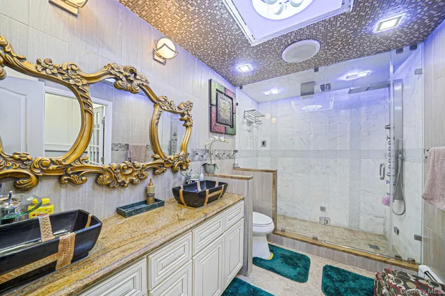 a bedroom with bed and a window