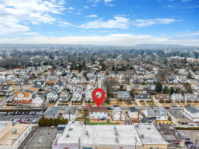 view of a house with a backyard space