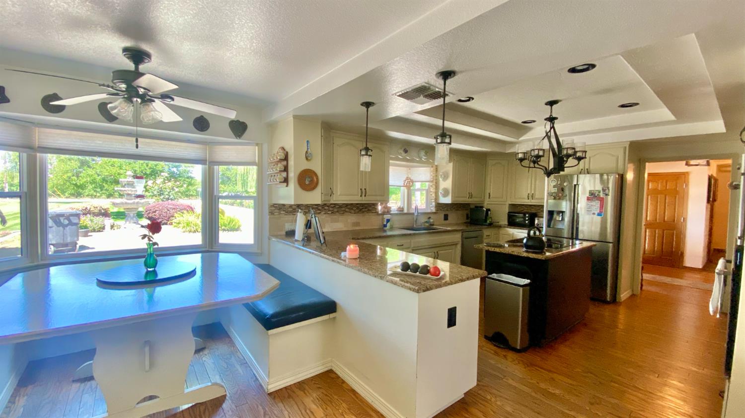 5012 Ustick Road Modesto, CA 95358 - Photo 13 of 26 a kitchen with stainless steel appliances granite countertop a stove and refrigerator