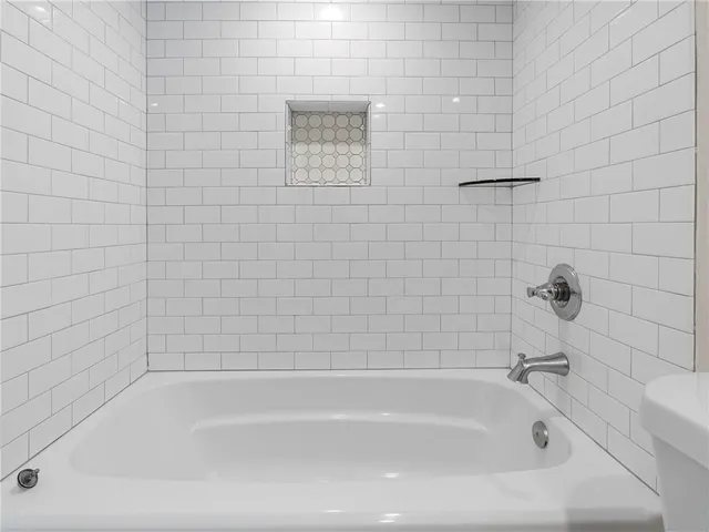 a bathroom with a bathtub