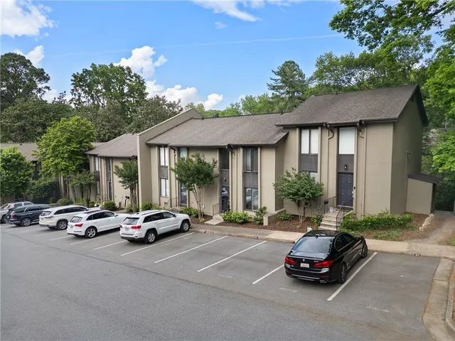 a car parked in front of a house