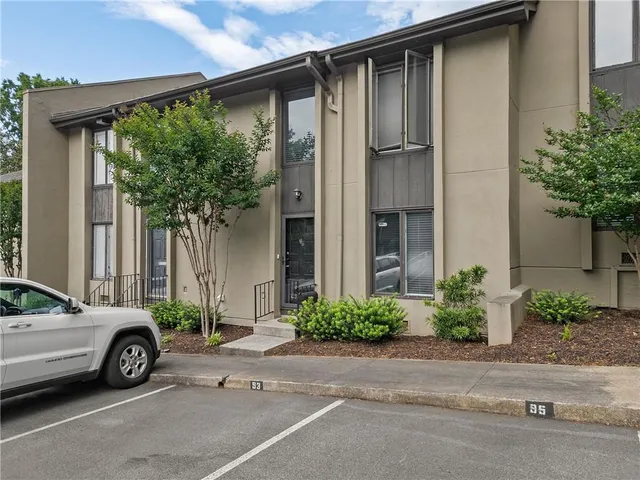 a car parked in front of a house
