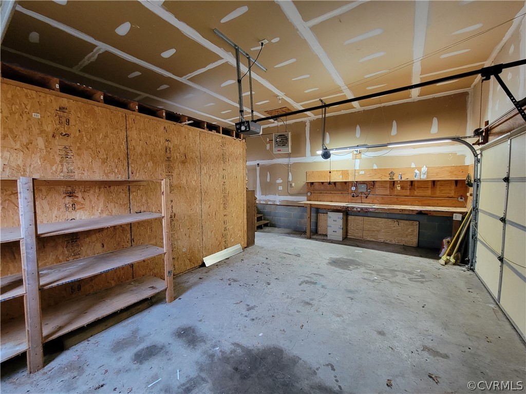 9666 Lockberry Ridge Loop Richmond, VA 23237 - Photo 13 of 26 2-car attached garage with work shop and storage room added