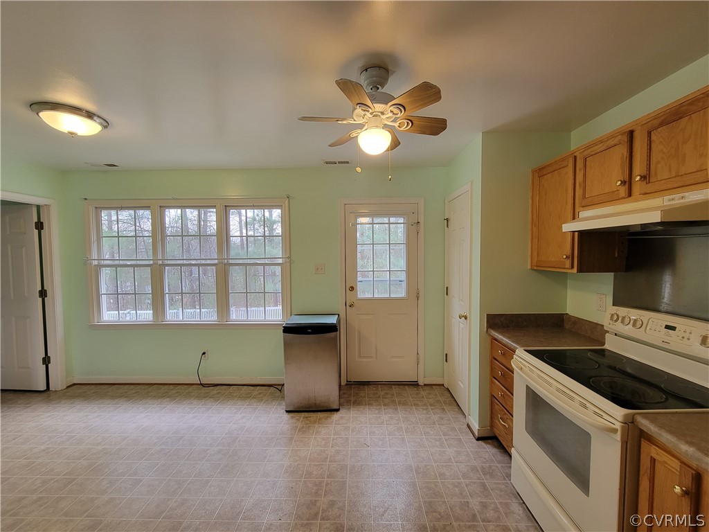 Plenty of room to add a table in front of the windows overlooking the back yard.