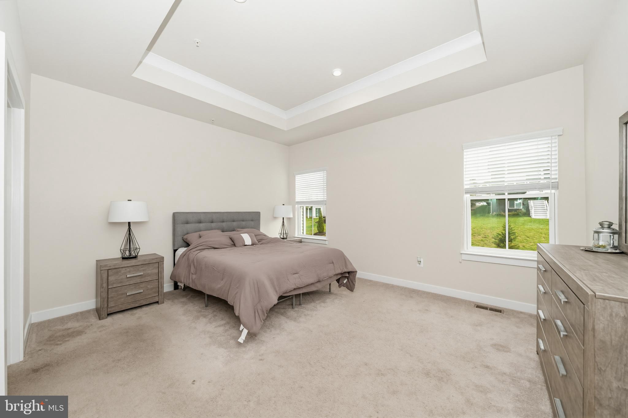 1326 Stonefly Lane Odenton, MD 21113 - Photo 20 of 48 a spacious bedroom with a bed and a window