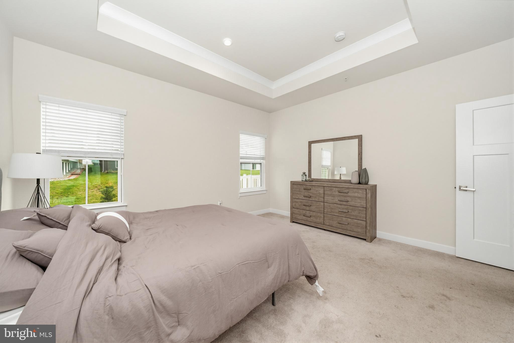 1326 Stonefly Lane Odenton, MD 21113 - Photo 21 of 48 a bedroom with a large bed and a window