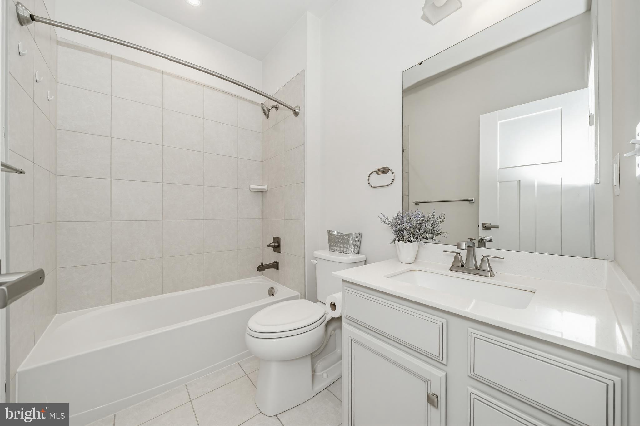 1326 Stonefly Lane Odenton, MD 21113 - Photo 29 of 48 a bathroom with a sink a toilet and shower