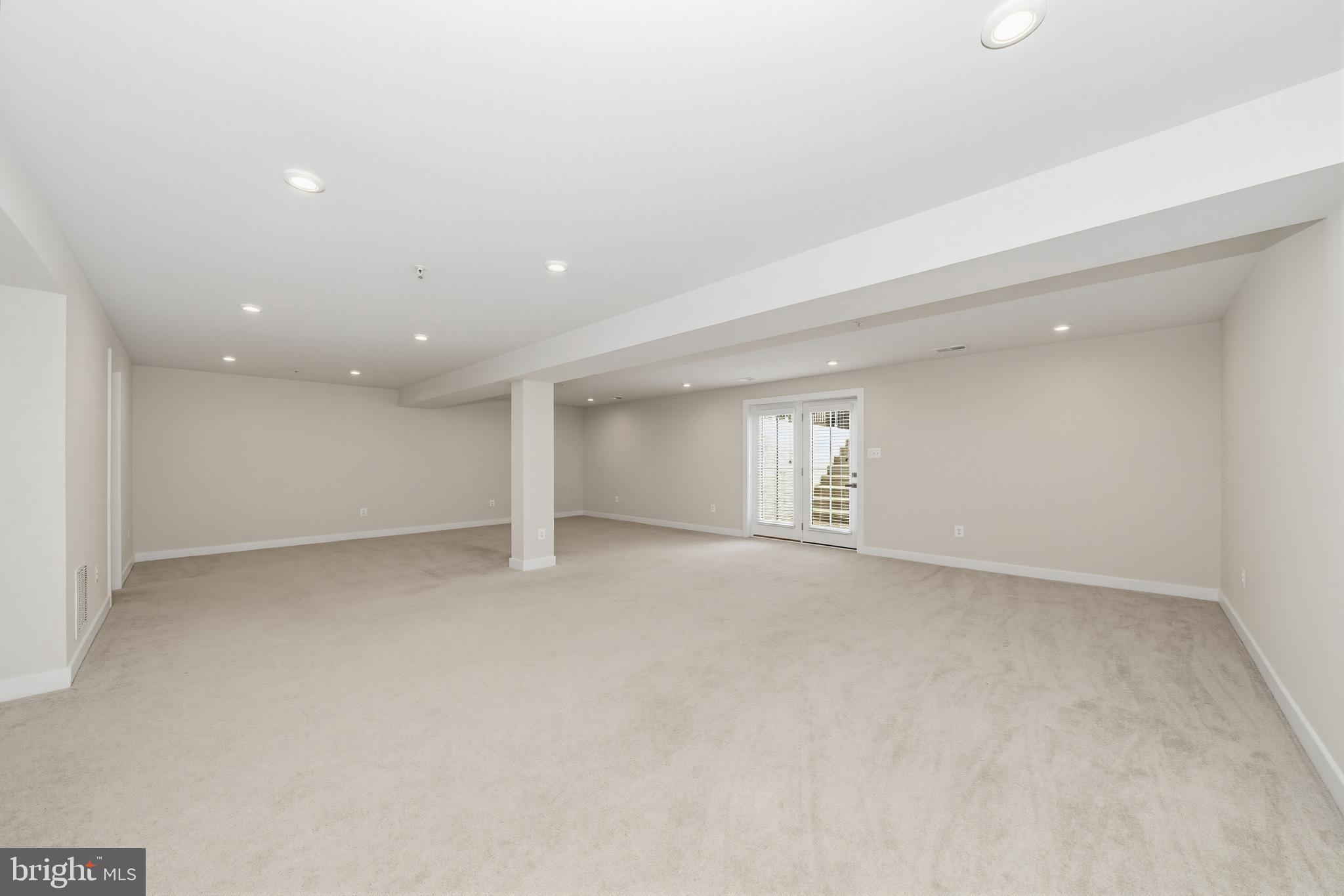 1326 Stonefly Lane Odenton, MD 21113 - Photo 31 of 48 an empty room with a empty space and windows