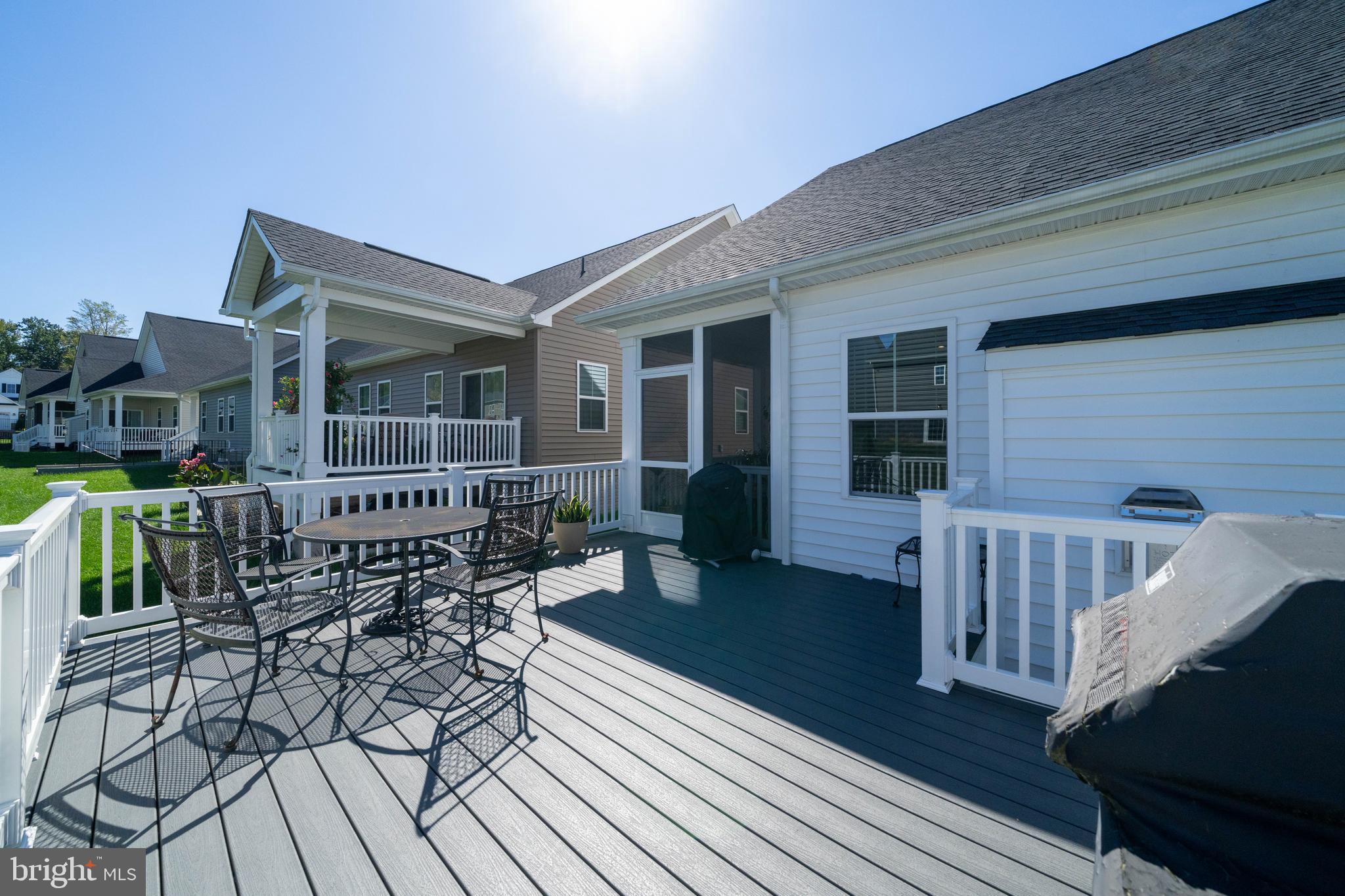 1326 Stonefly Lane Odenton, MD 21113 - Photo 38 of 48 a balcony with chairs and wooden floor