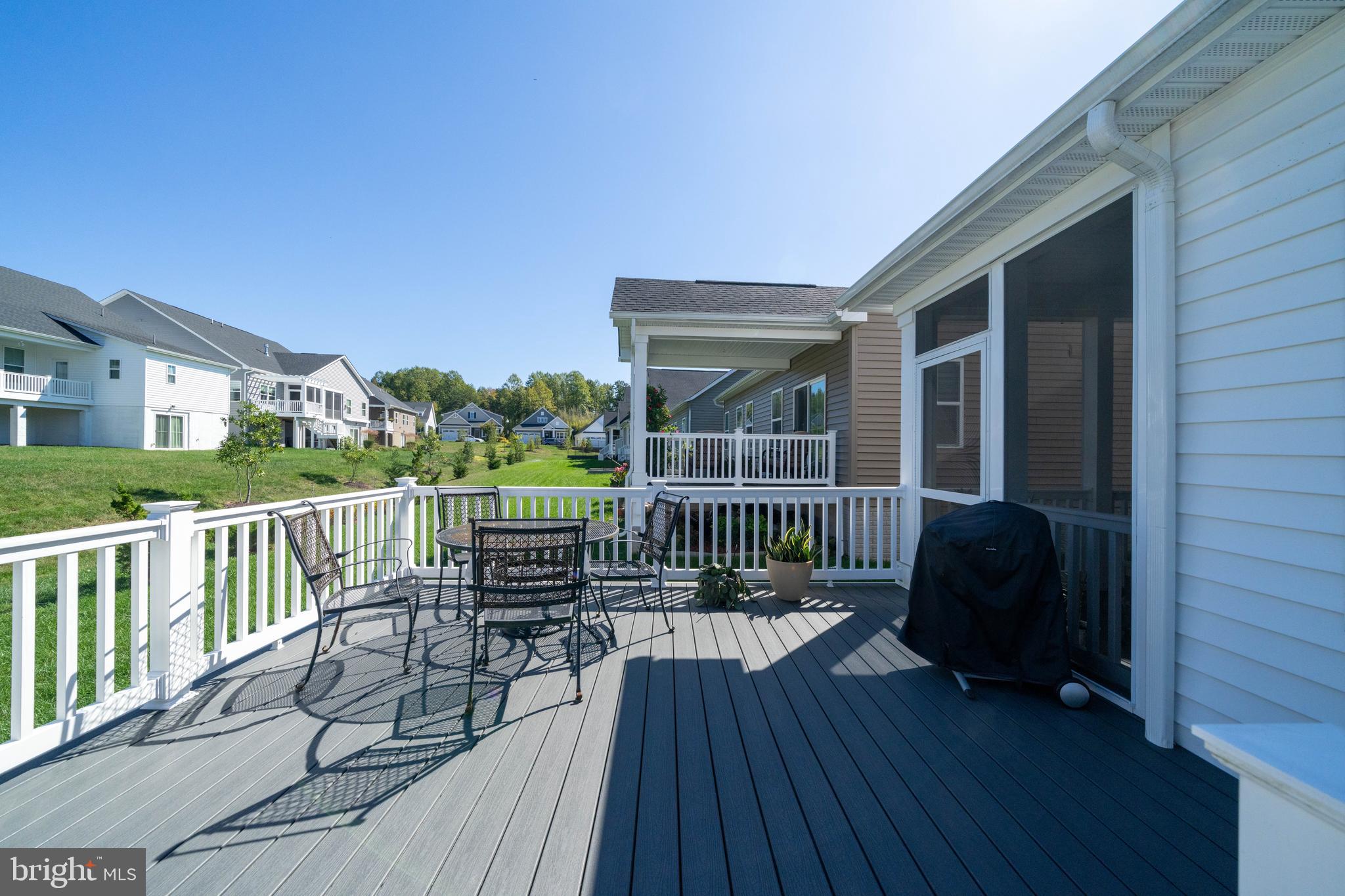 1326 Stonefly Lane Odenton, MD 21113 - Photo 39 of 48 a view of a deck with two couches and wooden floor