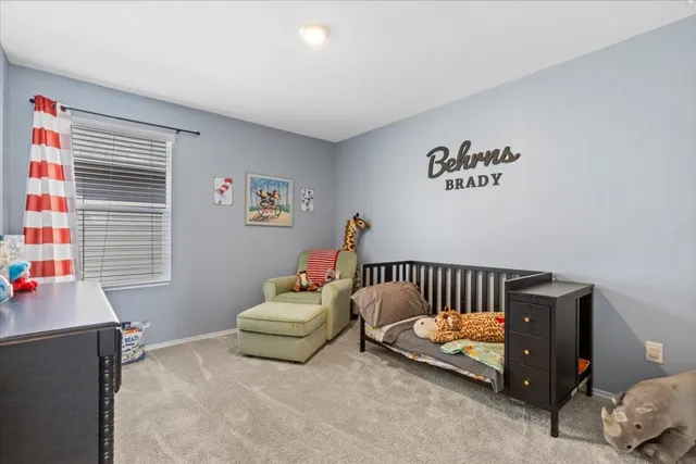 a living room with furniture and window
