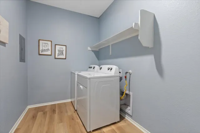 a view of a house with a yard and garage