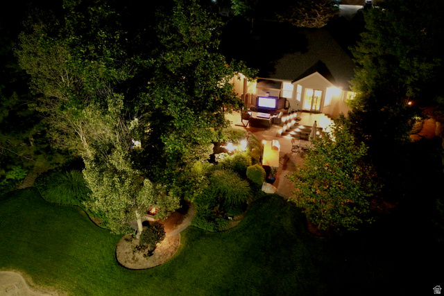 314 Brown Farm Lane Draper, UT 84020 - Photo 56 of 57 Backyard patio with tiered levels and perimeter lighting