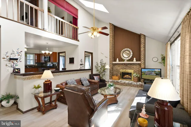 a dining room with furniture and entryway