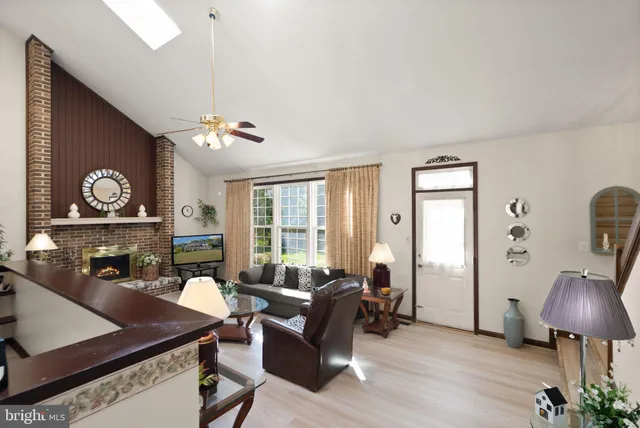 a living room with furniture and window