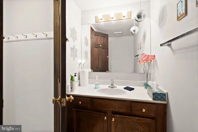 a bedroom with a bed and a chair