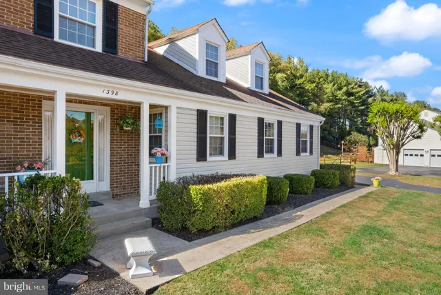 a room with furniture and a potted plant