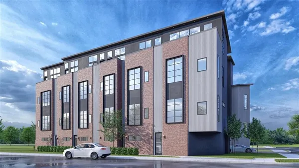 a couple of cars parked in front of building