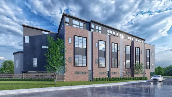 a front view of building with garden