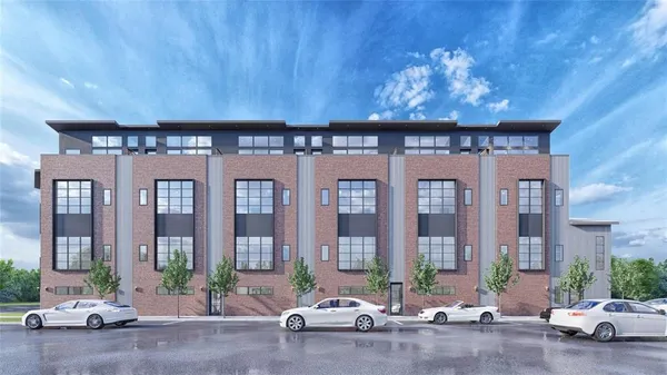 a view of a brick building with a large windows