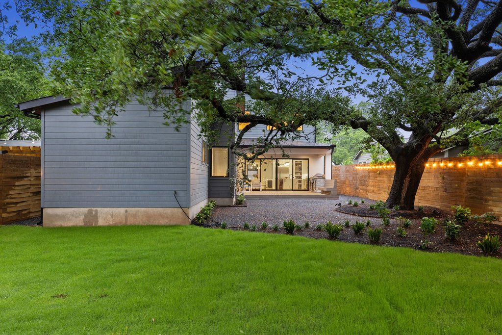 5405 Montview Street Austin, TX 78756 - Photo 2 of 40 The backyard is shaded by a magnificent heritage oak and plenty of yard space to accommodate a pool or ADU.