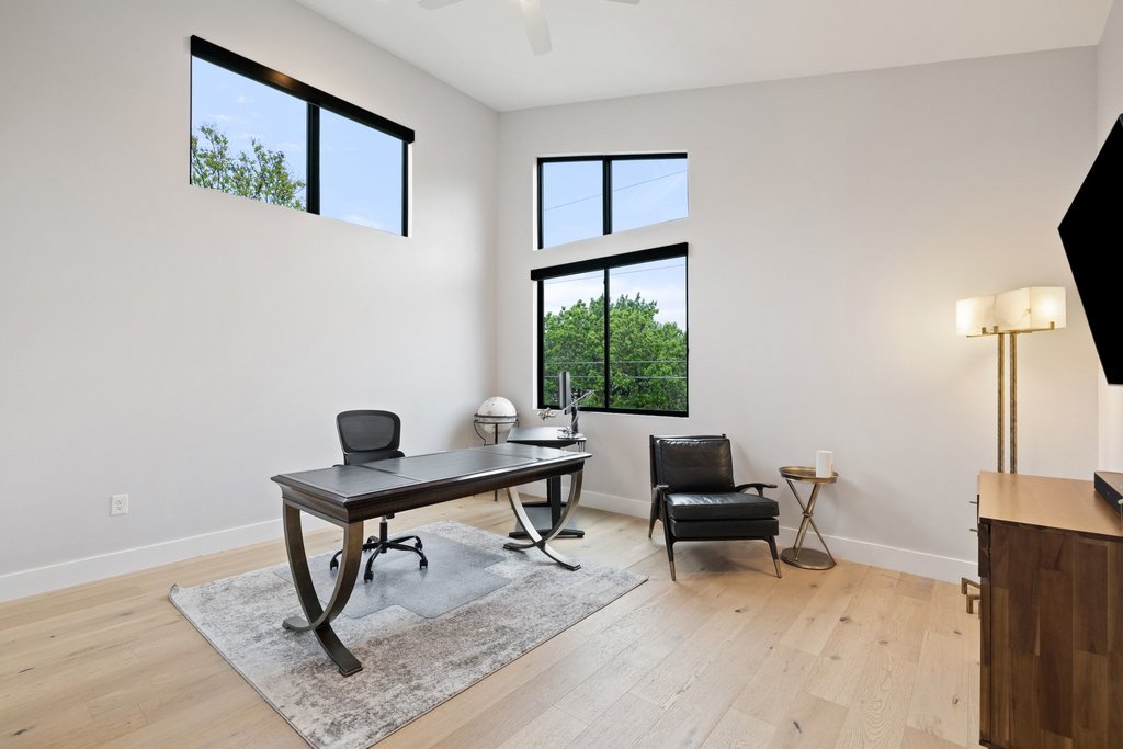 5405 Montview Street Austin, TX 78756 - Photo 30 of 40 Bedroom 5 sits under a soaring ceiling with breathtaking windows.