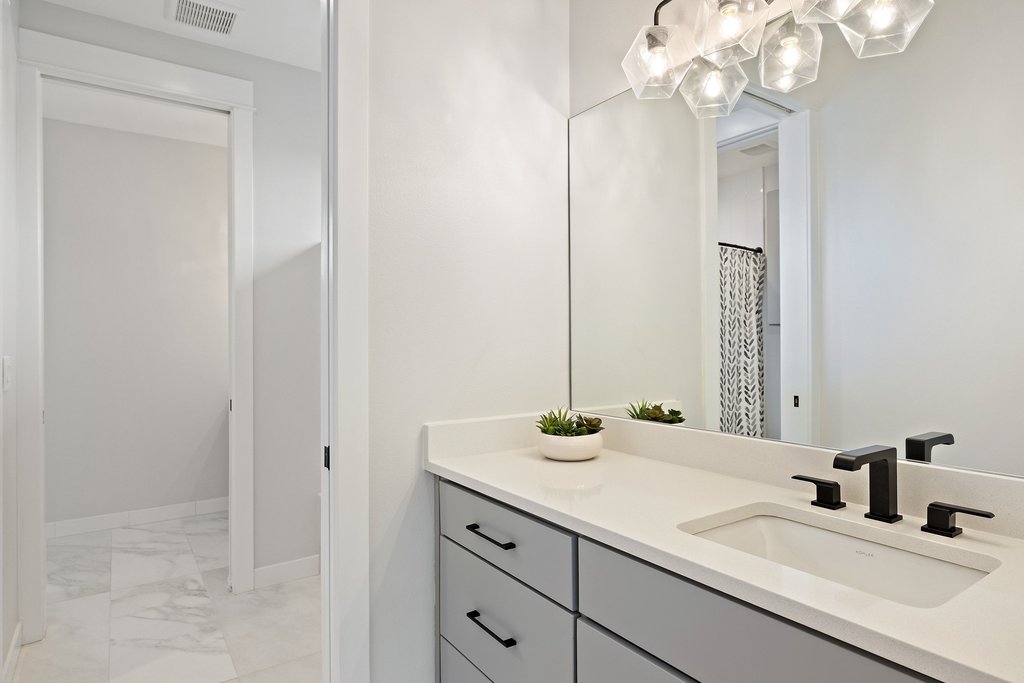 5405 Montview Street Austin, TX 78756 - Photo 31 of 40 A shared full bath accommodates the bedrooms upstairs.