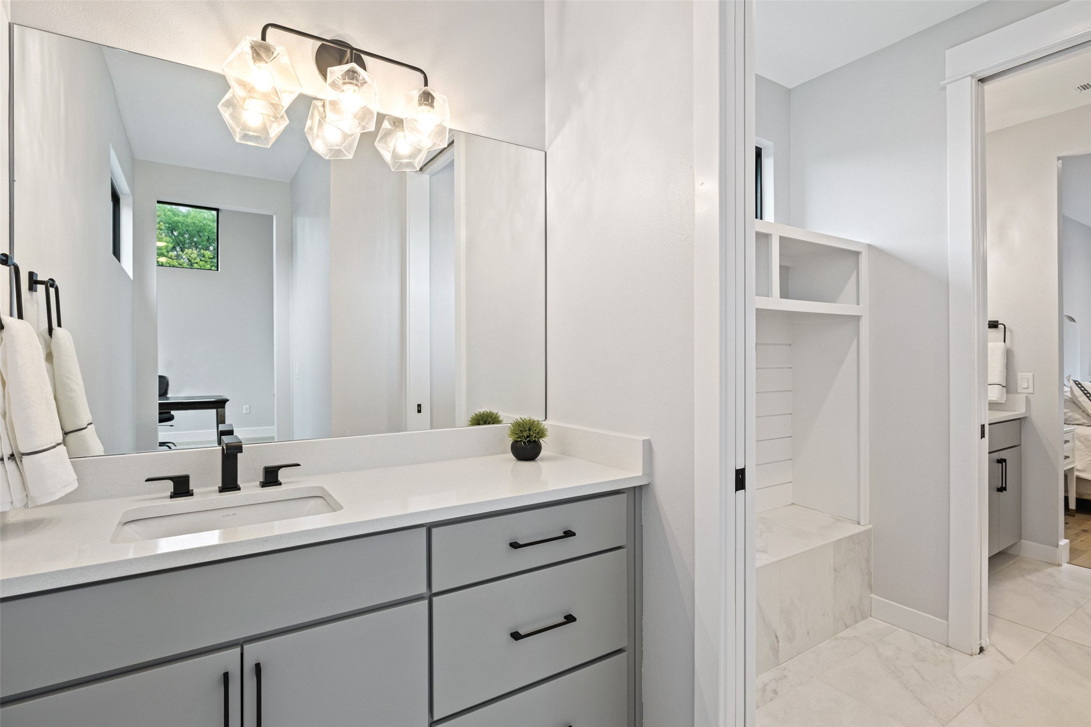 5405 Montview Street Austin, TX 78756 - Photo 32 of 40 The shared bath offer two separate vanity areas.