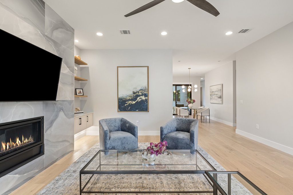 5405 Montview Street Austin, TX 78756 - Photo 5 of 40 The fireplace is flanked by sophisticated built-ins.