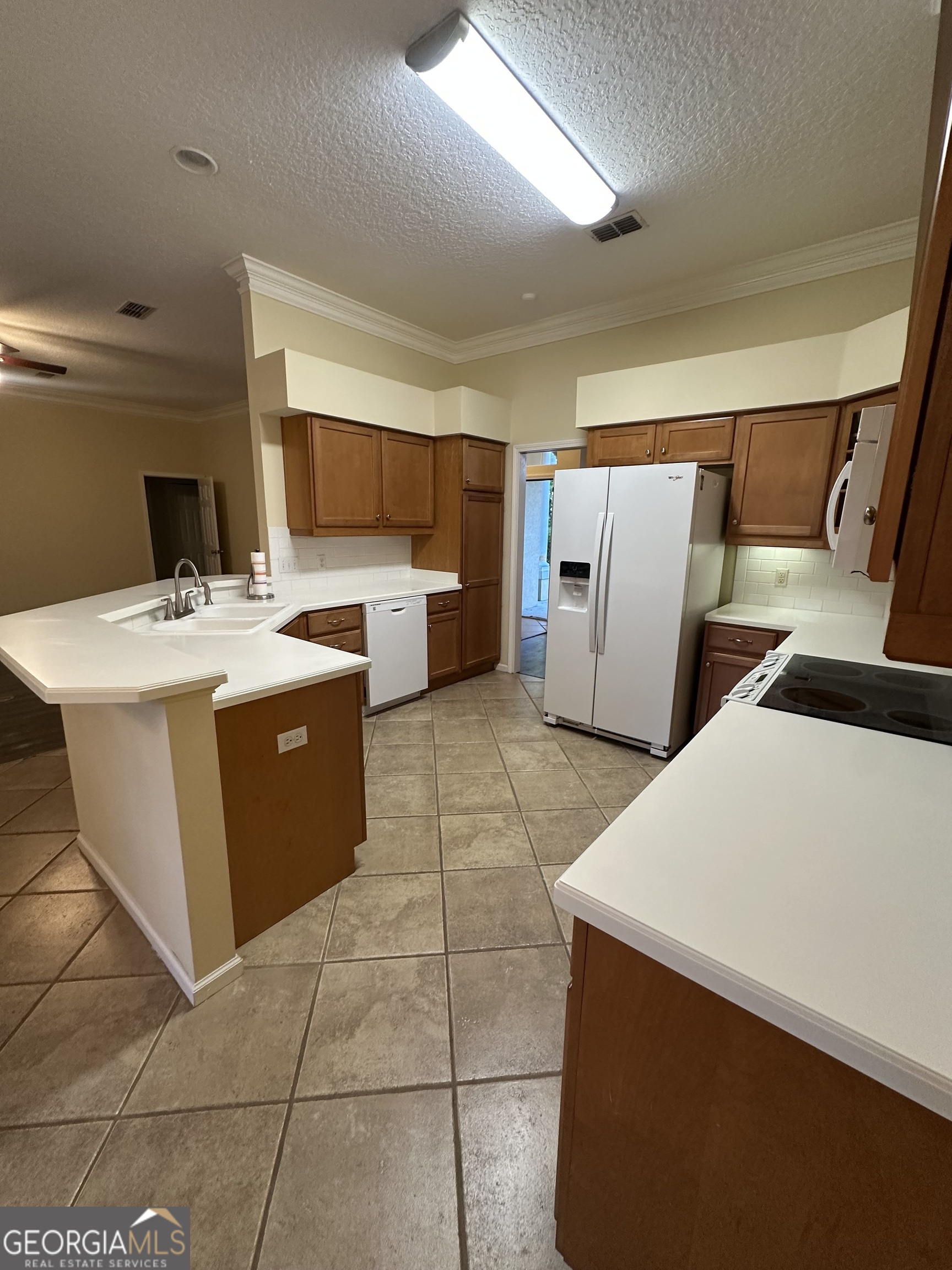 1024 Greenwillow Drive St. Marys, GA 31558 - Photo 11 of 35 a room with furniture a washer and dryer