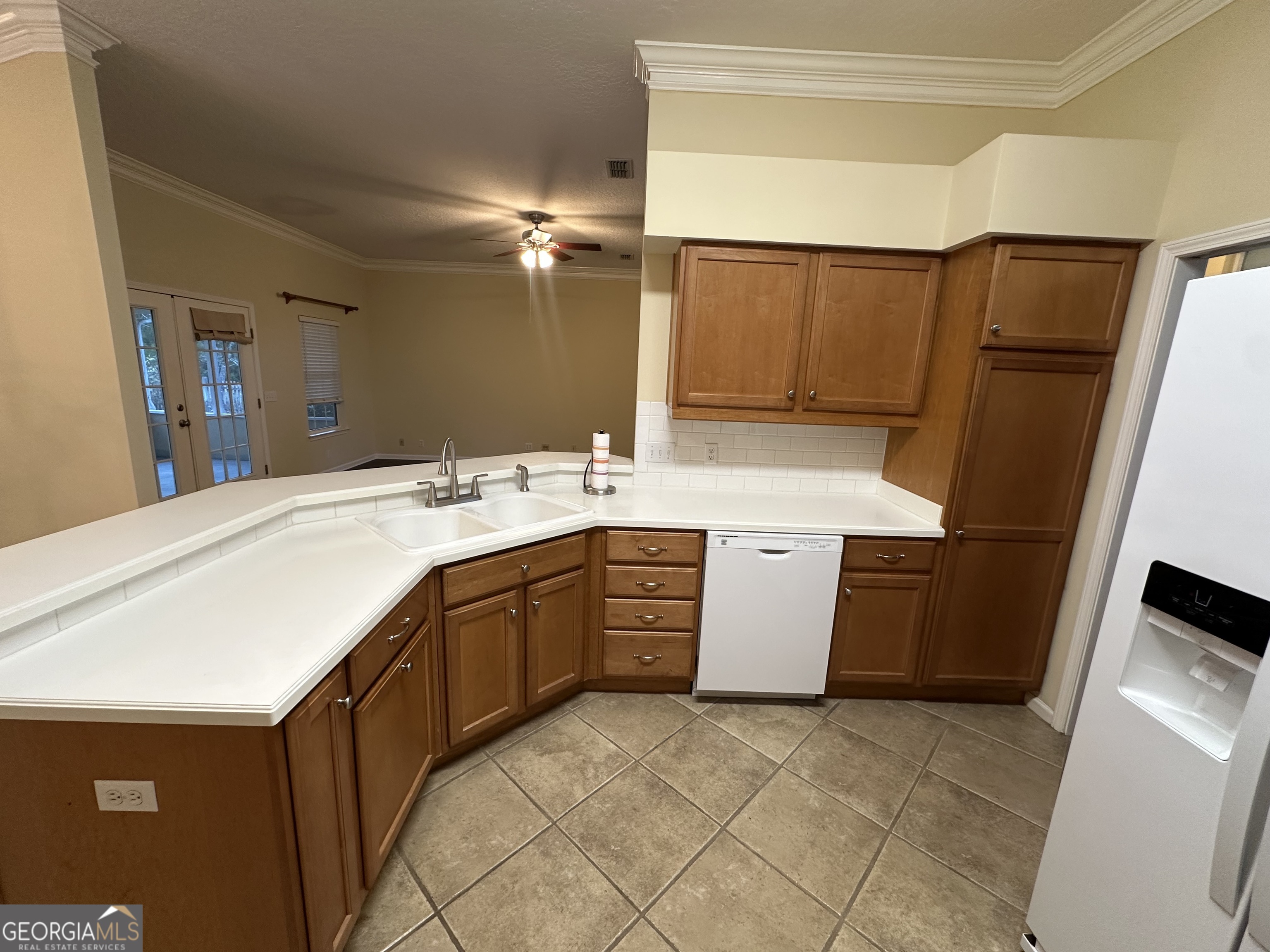 1024 Greenwillow Drive St. Marys, GA 31558 - Photo 14 of 35 a room with a sink a washer and dryer