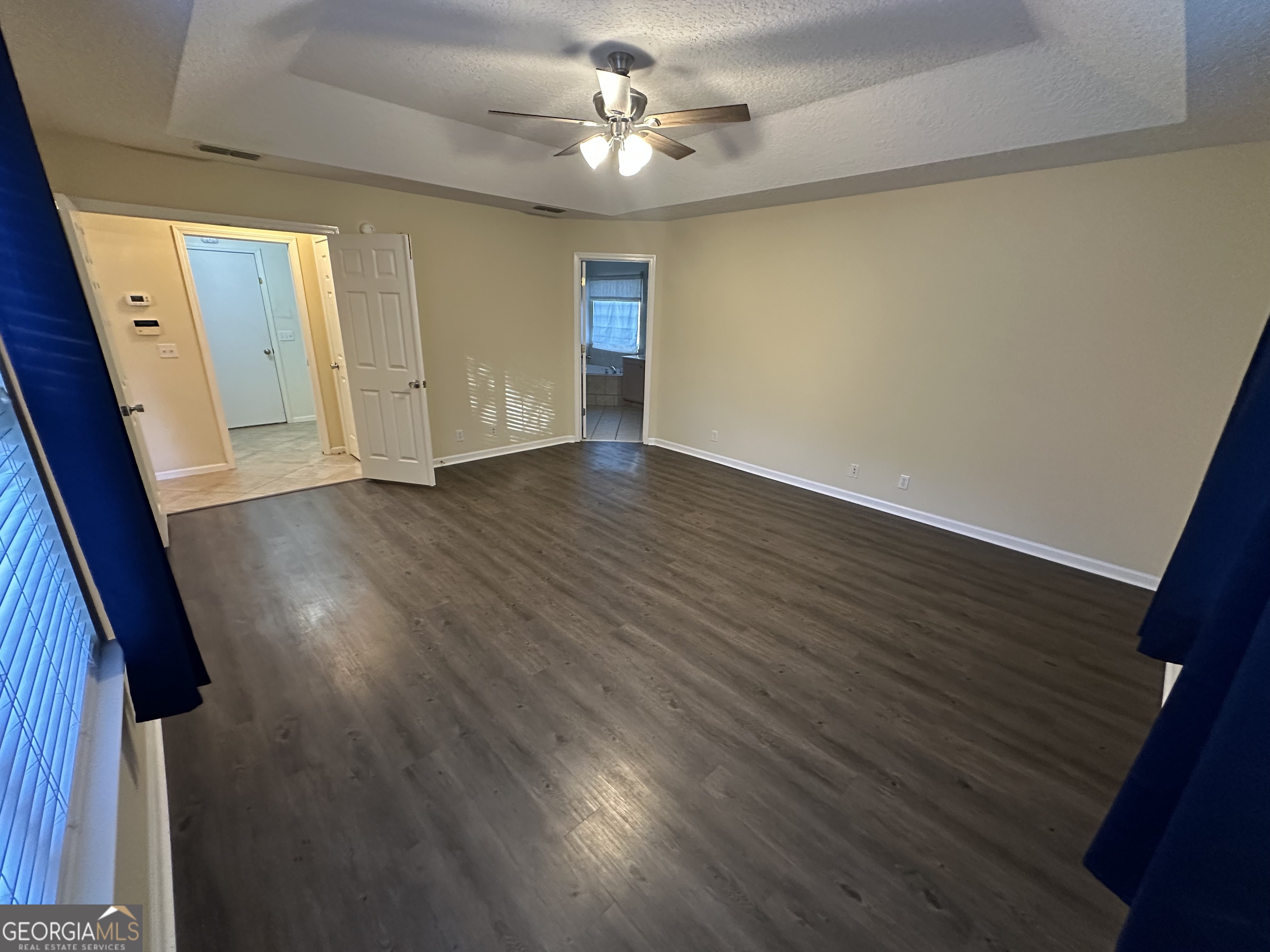 1024 Greenwillow Drive St. Marys, GA 31558 - Photo 16 of 35 wooden floor in an empty room with a window