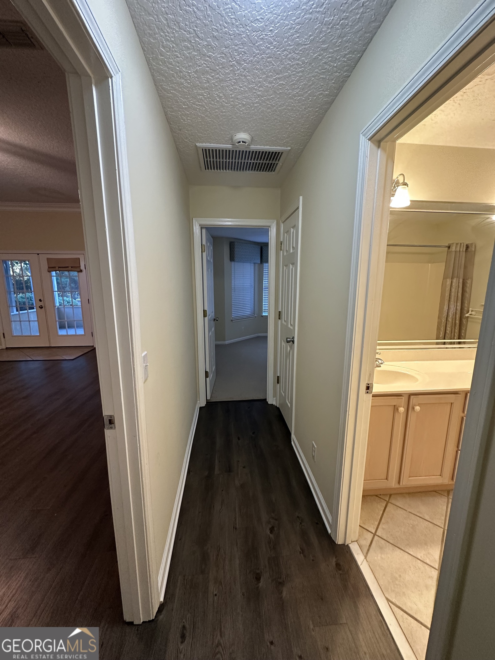 1024 Greenwillow Drive St. Marys, GA 31558 - Photo 25 of 35 a view of a hallway with wooden floor and stairs