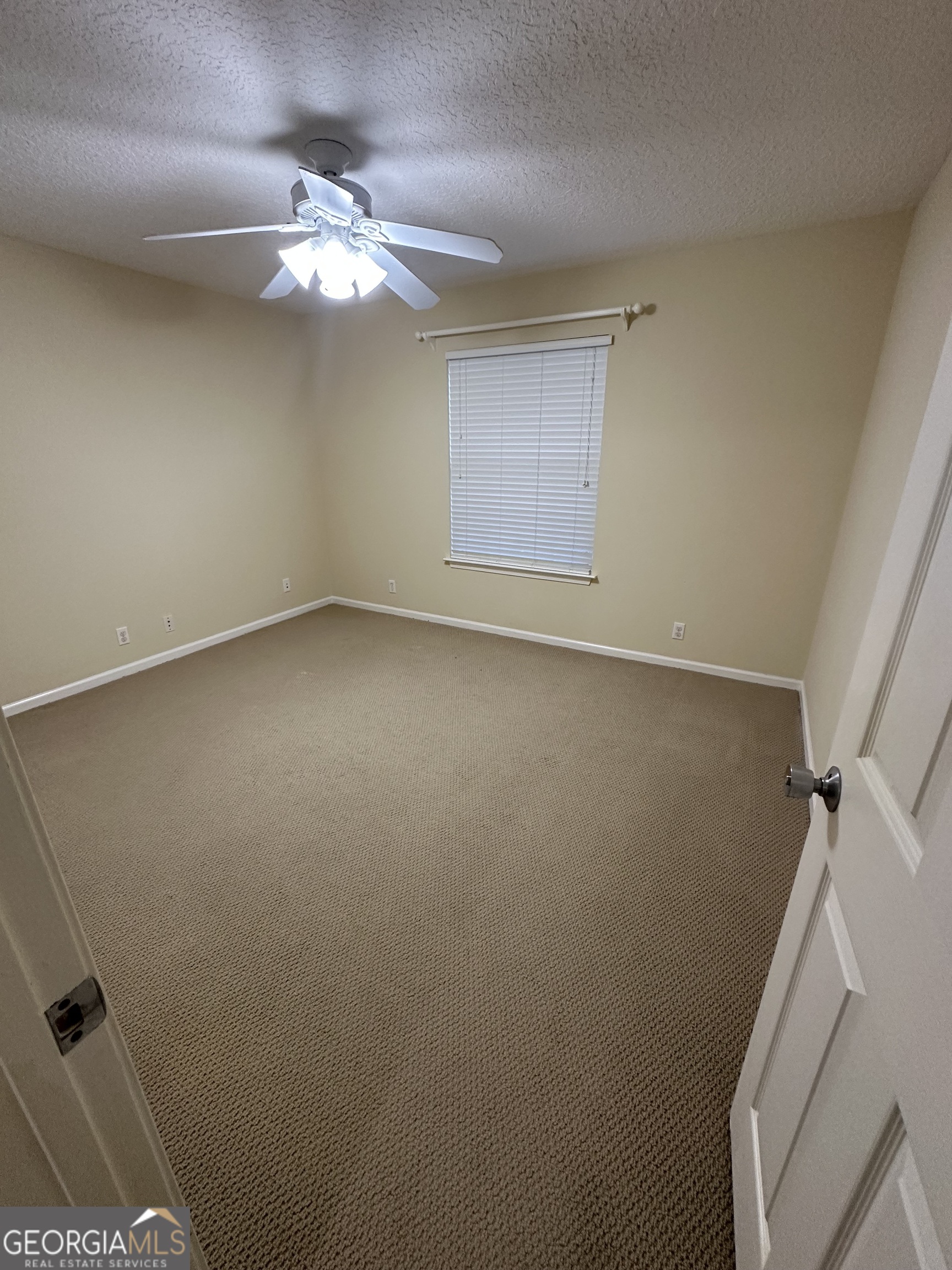 1024 Greenwillow Drive St. Marys, GA 31558 - Photo 30 of 35 a view of a livingroom with a fan