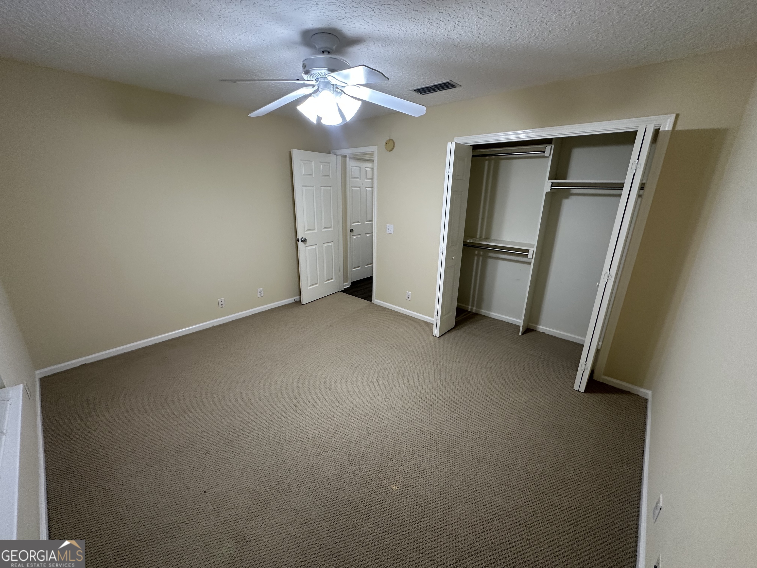 1024 Greenwillow Drive St. Marys, GA 31558 - Photo 33 of 35 wooden floor in an empty room with a window