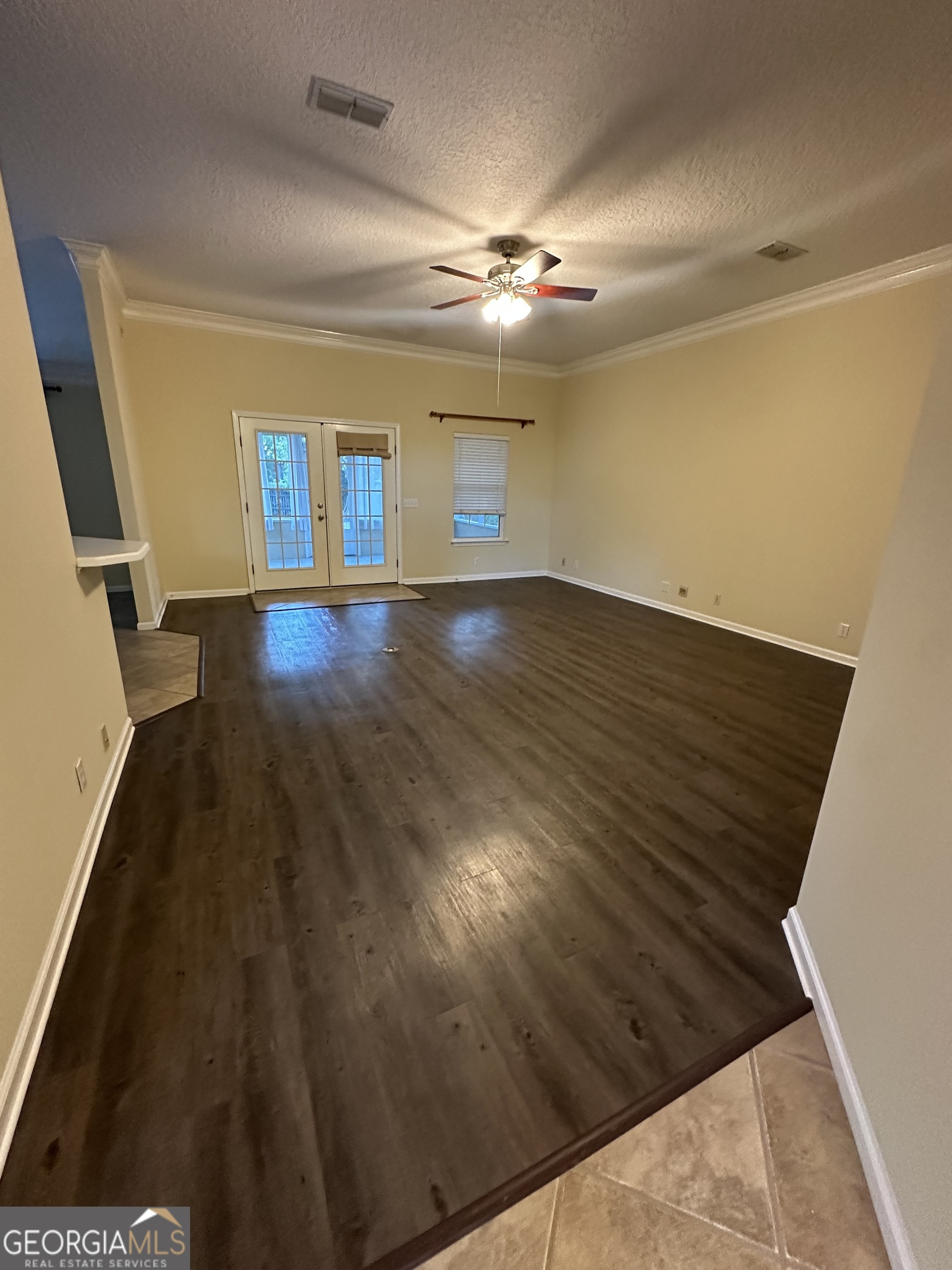 1024 Greenwillow Drive St. Marys, GA 31558 - Photo 35 of 35 wooden floor in an empty room with a window