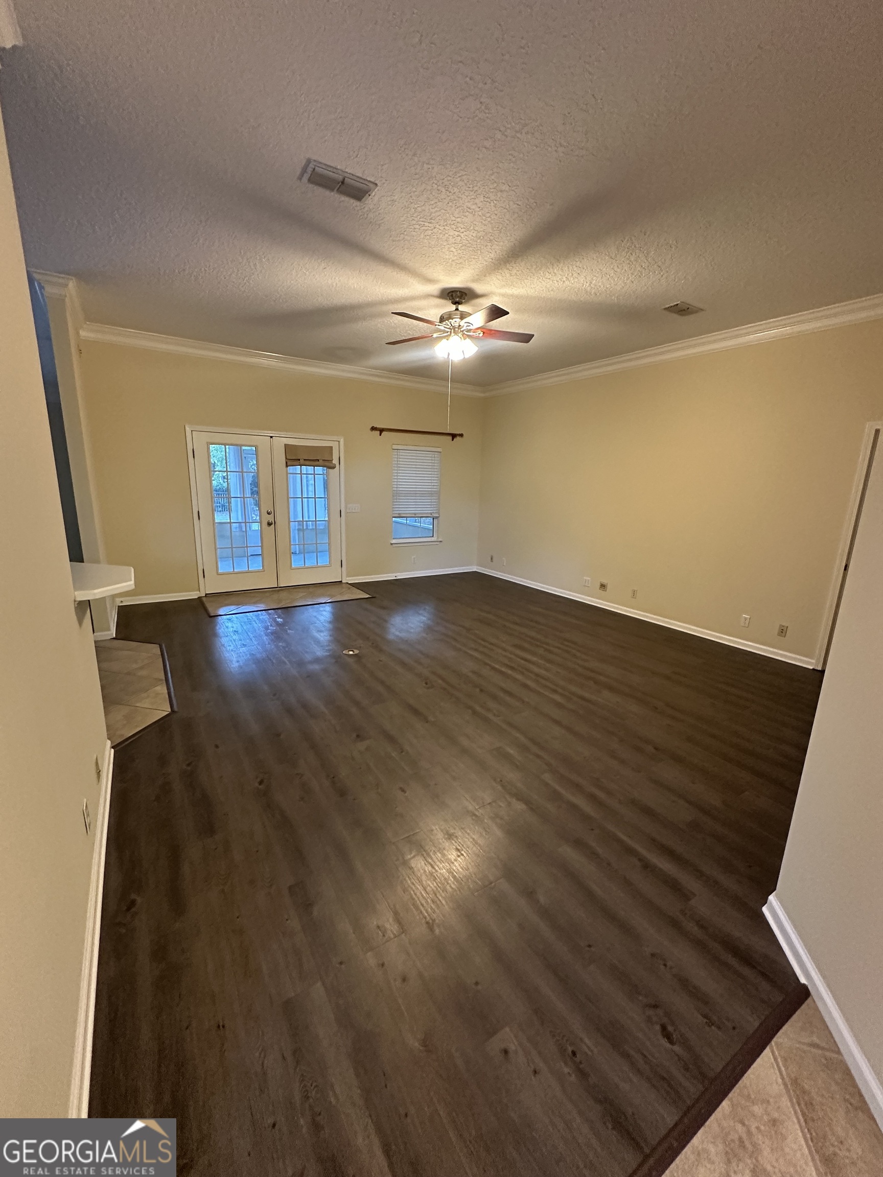 1024 Greenwillow Drive St. Marys, GA 31558 - Photo 7 of 35 wooden floor in an empty room with a window
