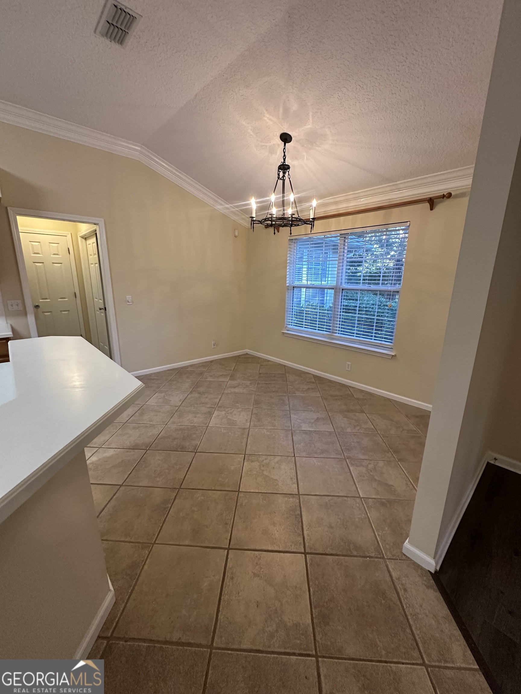 1024 Greenwillow Drive St. Marys, GA 31558 - Photo 10 of 35 a view of a livingroom with a furniture and chandelier fan