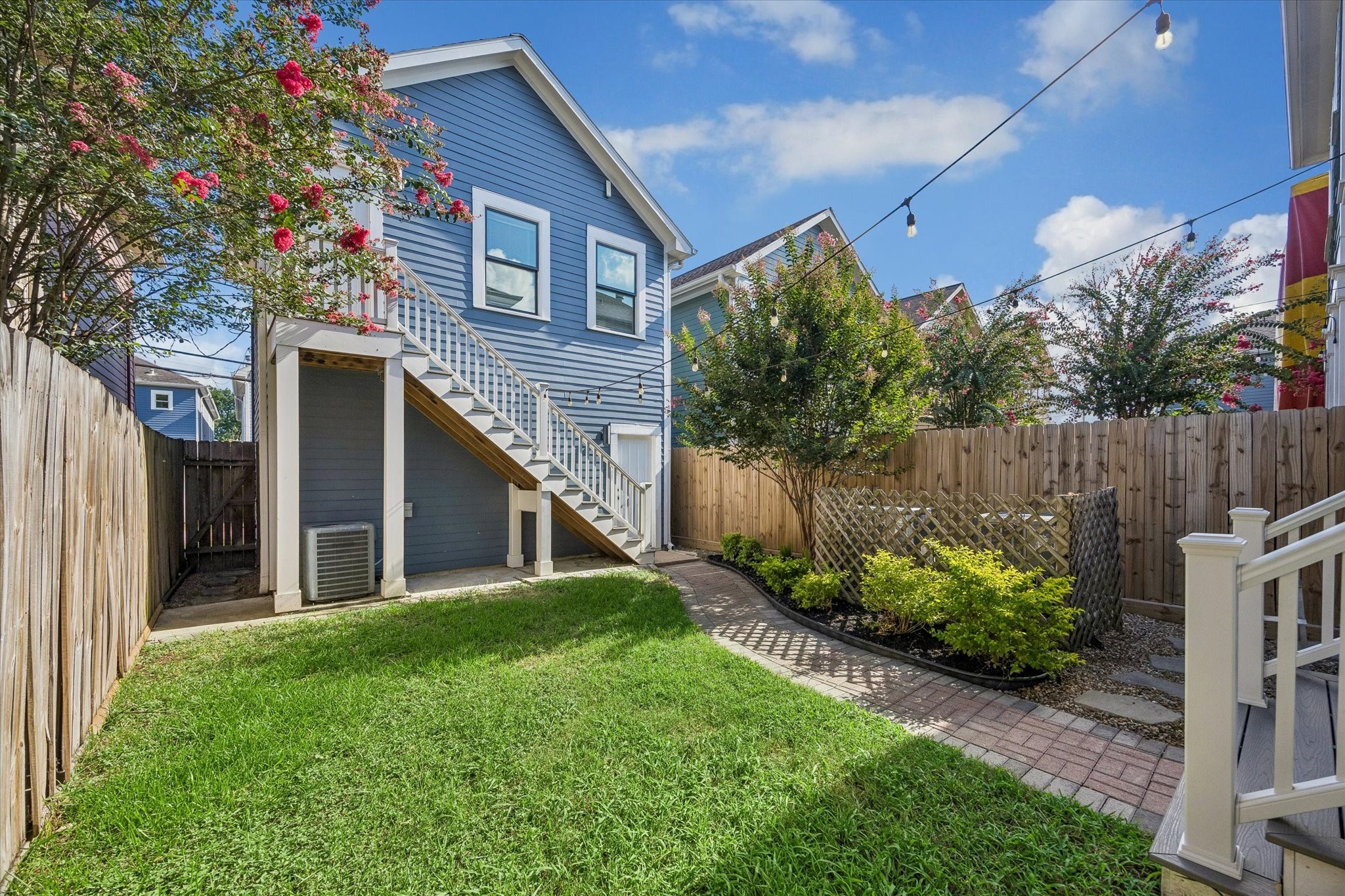 634 West 17th Street Houston, TX 77008 - Photo 29 of 42 This private backyard brings together the best of Heights living, with a covered Trex porch, grassy lawn, pretty landscaping, and a bricked walkway leading to the separate guest quarters above the garage.